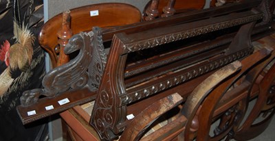 Lot 798 - A mahogany carved plate rack flanked by...