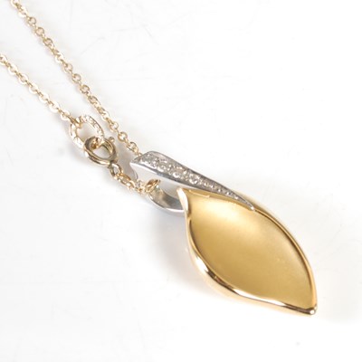 Lot 245 - An 18ct white and yellow gold diamond set...