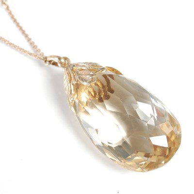 Lot 246 - A yellow metal smoky quartz pendant necklace,...