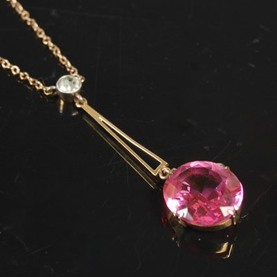 Lot 249 - A yellow metal gem set pendant necklace...