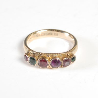 Lot 254 - A 9ct gold ring set with an older six stone...