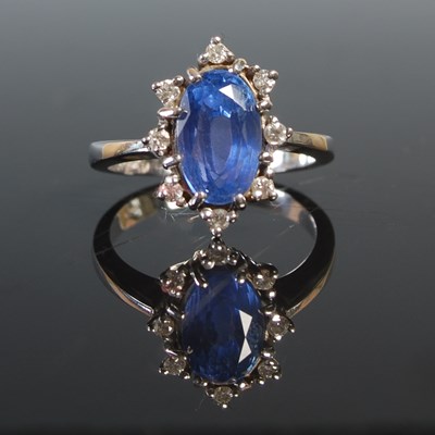 Lot 260 - A white metal tanzanite and diamond cluster...