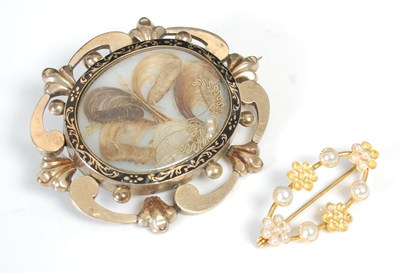 Lot 273 - A gold plated Victorian mourning brooch with...
