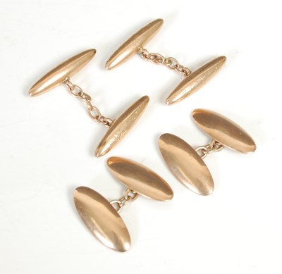 Lot 277 - A pair of 9ct gold oval cufflinks; together...