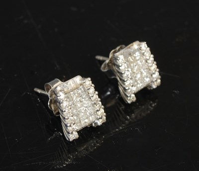 Lot 280 - A pair of 20th century white metal and diamond...