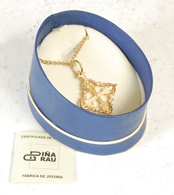 Lot 223 - A yellow metal Mallorcan cross pendant and...