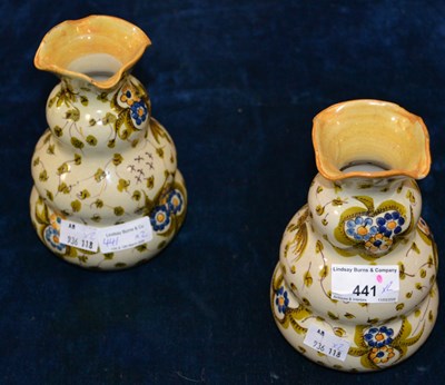 Lot 441 - A pair of Cantagalli yellow ground pottery...