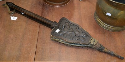 Lot 460 - A 19th century oak bellow with carved floral...