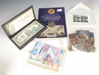 Lot 294 - A collection of assorted coins, banknotes and...