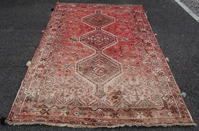 Lot 808 - A Persian long rug, 20th century, the abrashed...