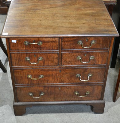 Lot 647 - A 19th century bachelor's chest, the hinged...