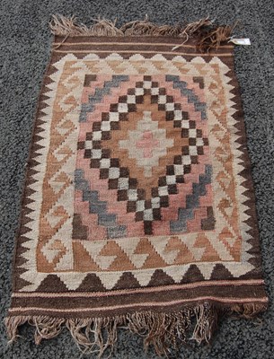 Lot 812 - A small Kilim flatweave rug, 20th century, the...