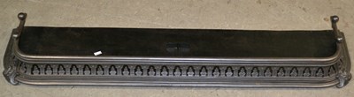Lot 671 - A 19th century cast iron fire fender with...