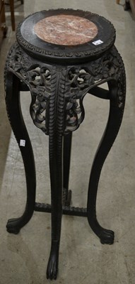 Lot 707 - A Chinese darkwood urn stand, late Qing...