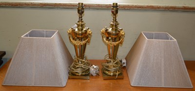 Lot 708 - A pair of 20th century brass table lamps in...