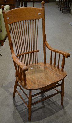 Lot 715 - A blonde wood spindle back armchair, possibly...