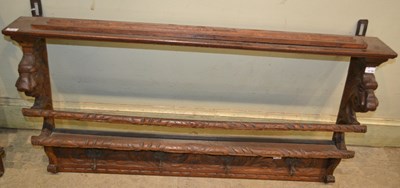 Lot 743 - A carved oak hanging wall plate, 57cm high x...