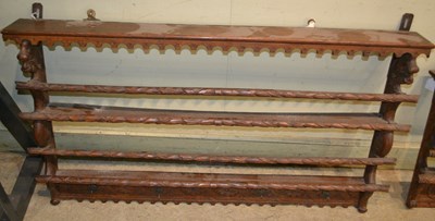 Lot 744 - A carved oak hanging wall plate, 68cm high x...