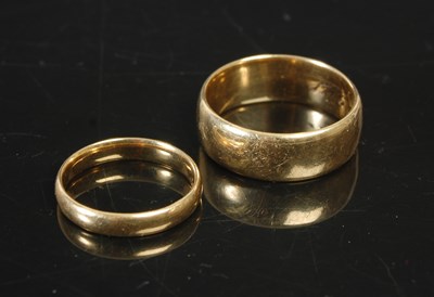 Lot 263L - Two 18ct gold rings, the larger ring size S,...