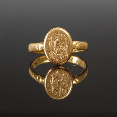 Lot 263P - An Australian gold ring, the oval ring head...