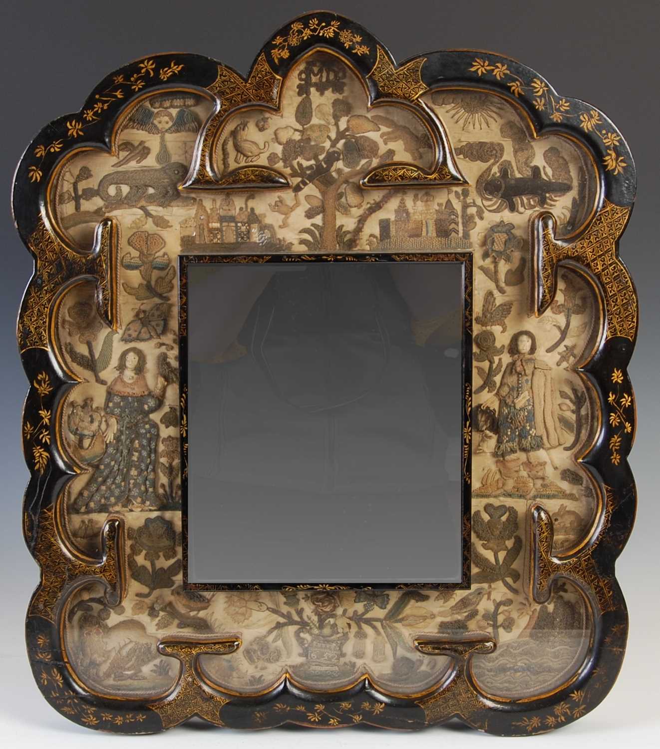 Lot 219 - A mid 17th century stumpwork and lacquer...