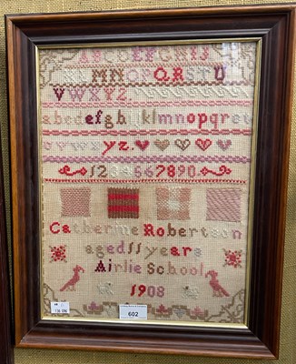 Lot 602 - An early 20th century needlework sampler by...
