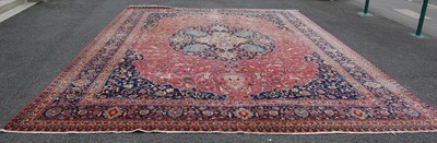 Lot 825 - An early to mid-20th century Persian carpet,...