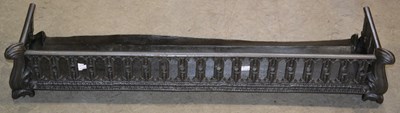 Lot 676 - A 19th century cast iron fire fender with...