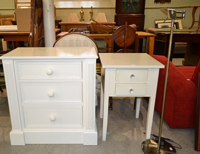Lot 680 - A 20th century painted pine three drawer chest...