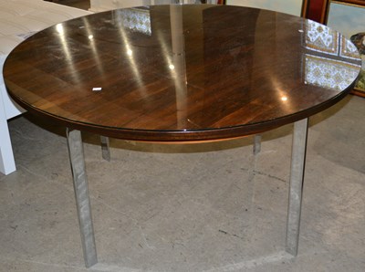 Lot 687 - A 20th century rosewood circular dining table,...