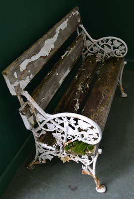 Lot 697 - A 19th century cast iron garden bench, with...