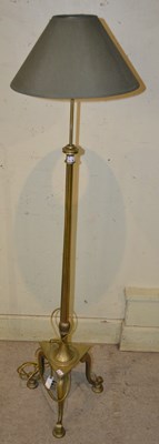Lot 700 - An early 20th century brass standard lamp with...