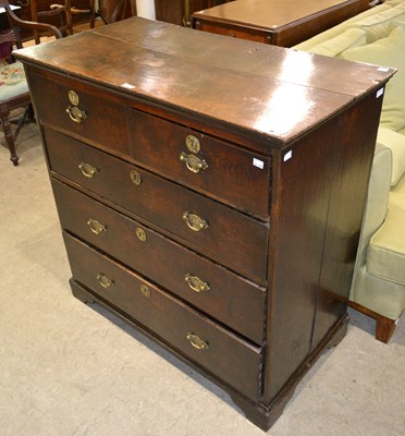 Lot 683B - A George III oak two over three chest of...