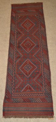 Lot 751 - A Meshwani runner, worked in shades of madder...