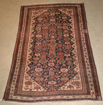 Lot 753 - An antique Qashqai rug, the rectangular blue...