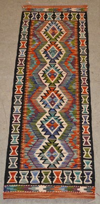 Lot 756 - A Chobi Kilim runner, the ivory coloured...