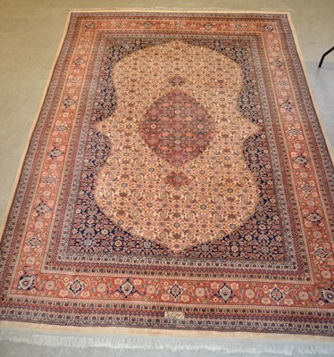 Lot 764 - A vintage Persian rug, the rectangular field...