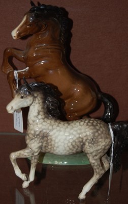 Lot 9 - Two Beswick horses comprising a rearing Welsh...