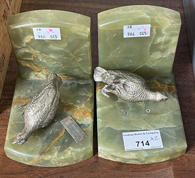 Lot 714 - A pair of green onyx bookends with pheasant...