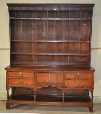 Lot 1045 - A 19th century oak pot board dresser with four...