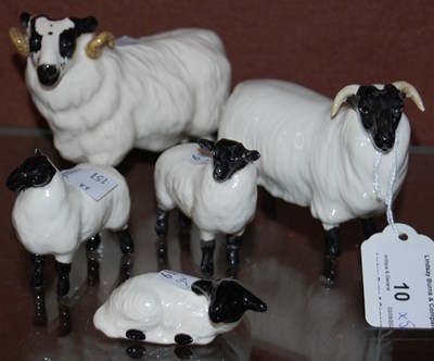 Lot 10 - A Beswick ram, ewe and three lambs (x5)
