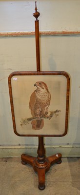 Lot 1041 - A 19th century fire screen featuring a...