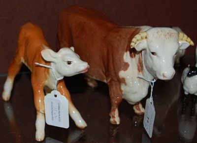 Lot 11 - A Beswick model of a Hereford bull and calf