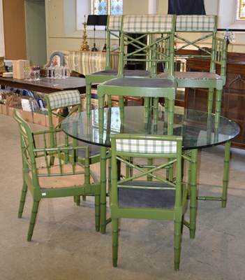 Lot 1112 - A faux bamboo circular dining table with glass...