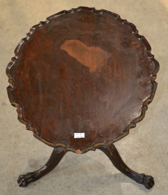 Lot 1098 - A George III style mahogany pie crust wine...