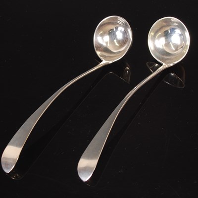 Lot 204 - A pair of Scottish silver toddy ladles, by...