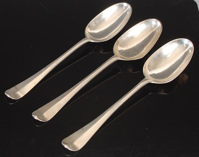 Lot 152 - Three George III Scottish silver tablespoons,...