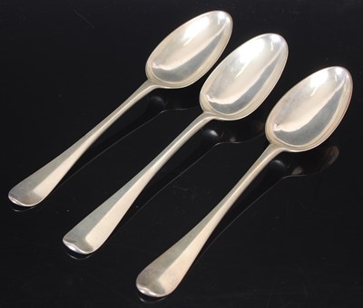 Lot 155 - Three George III Scottish silver tablespoons,...