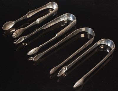 Lot 111 - Four pairs of Scottish provincial silver sugar...