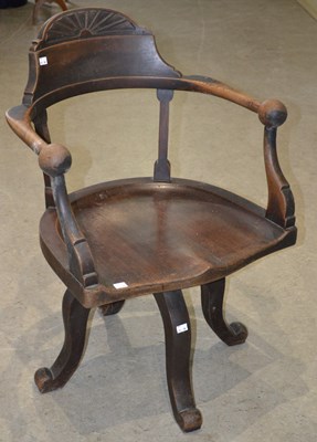 Lot 1119 - A late 19th century Captain's chair in the...